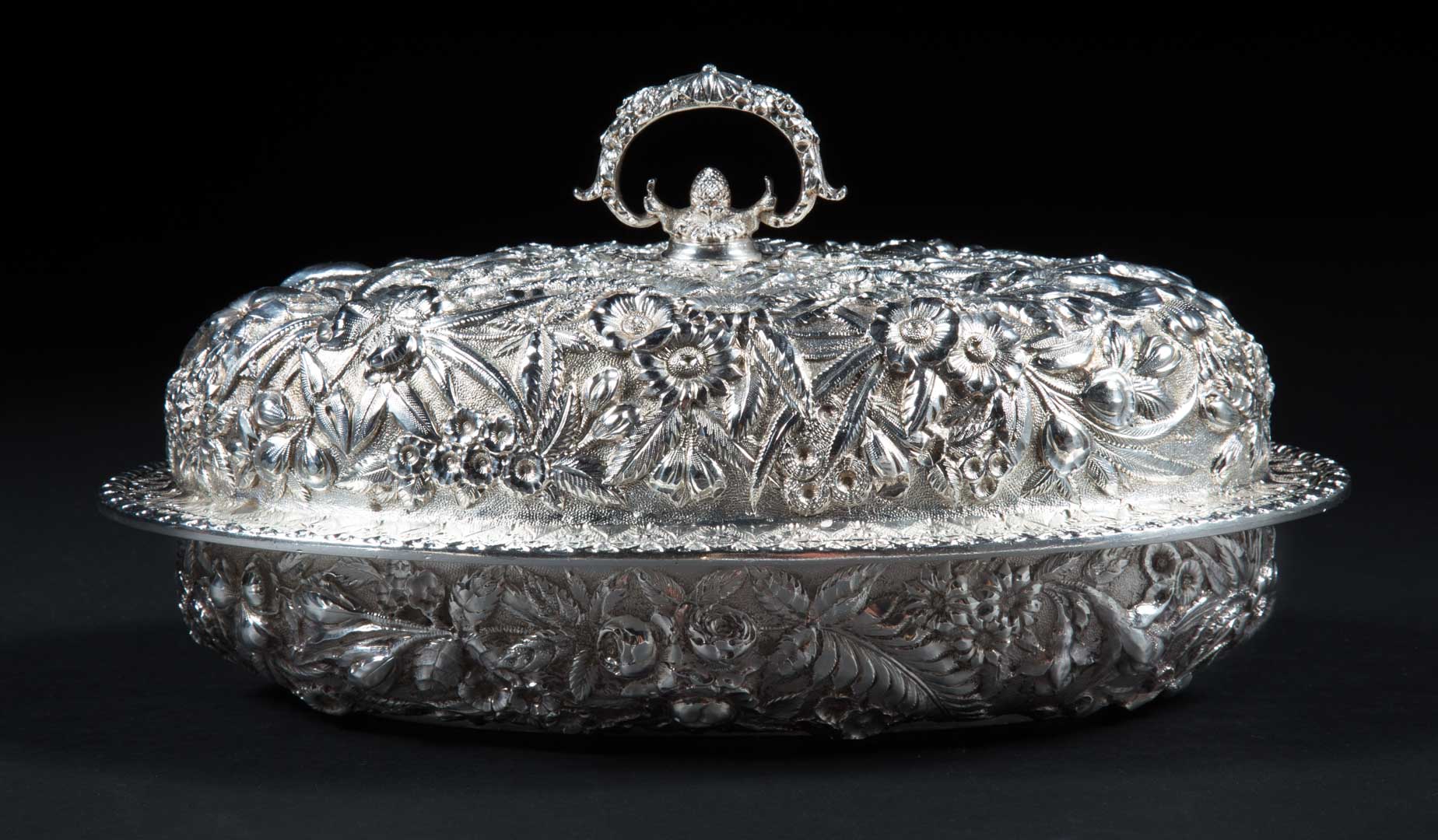 Appraisal: Kirk repousse sterling covered vegetable dish in H x in