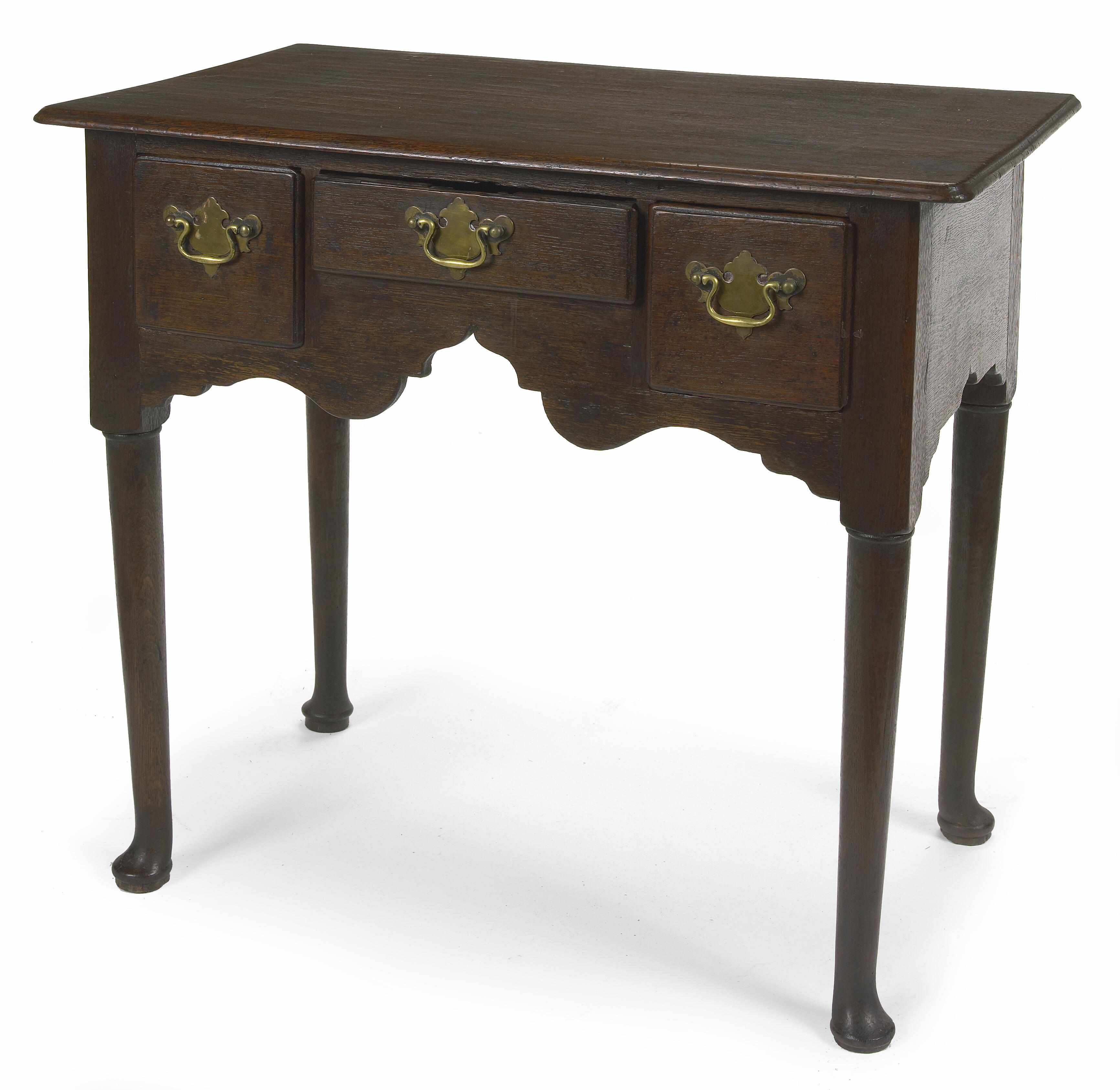 Appraisal: A George III oak lowboy height in width in depth