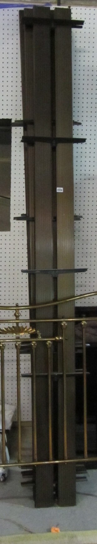 Appraisal: Four metal uprights in a different finish with glass shelving