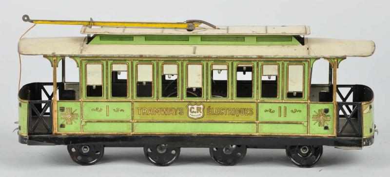 Appraisal: Clockwork Charles Rossignol Train Trolley Toy Description French Circa Marked