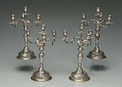 Appraisal: Set four Viennese silver candelabra each with spiral base acanthus