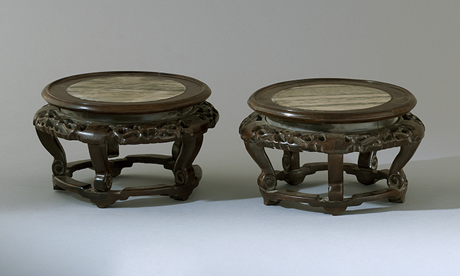 Appraisal: PAIR OF MARBLE-INLAID CARVED WOOD STANDS th CenturyIn circular form