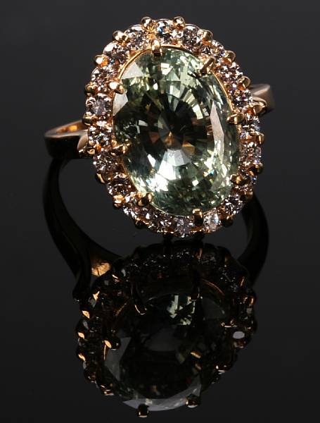 Appraisal: A green sapphire diamond and k yellow gold ring grams