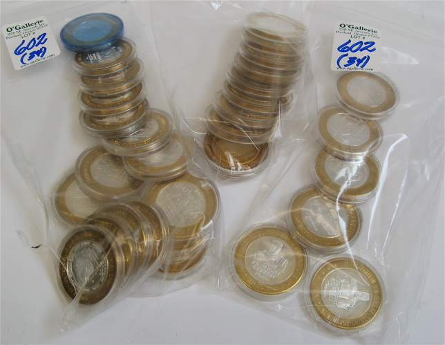 Appraisal: THIRTY-FOUR SILVER GAMING TOKENS in denominations limited edition engraved brass