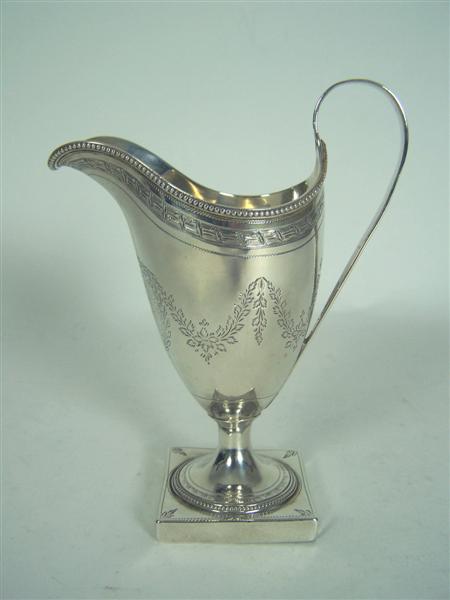 Appraisal: A George III helmet cream jug GB London of slender