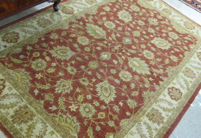 Appraisal: HAND KNOTTED ORIENTAL CARPET Pakistani Zeigler overall floral design on