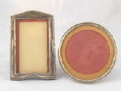 Appraisal: A circular silver photo frame cm diameter Birmingham and a