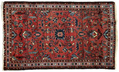 Appraisal: Persian rug tree and floral designs on brick red field