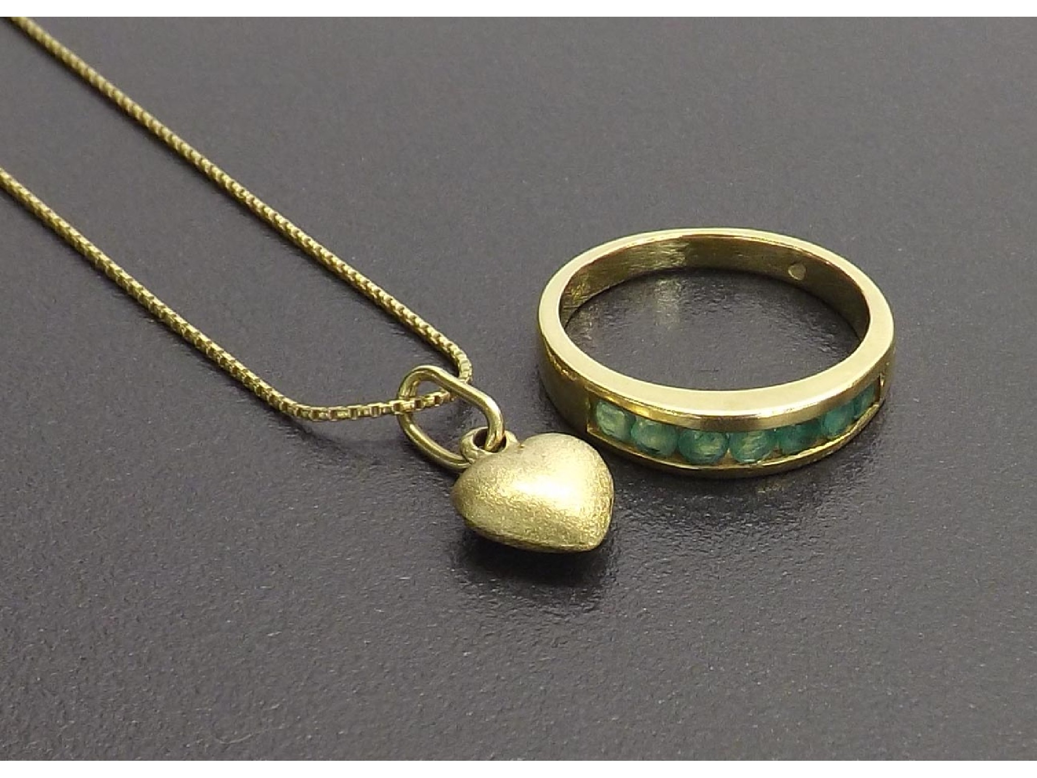 Appraisal: ct half hoop ring and an ct heart pendant on