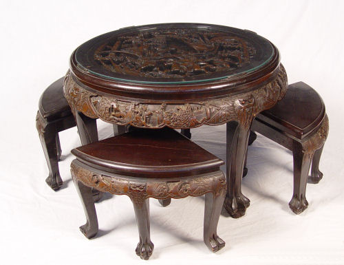 Appraisal: DEEPLY CARVED CHINESE CHOW TABLE WITH STOOLS Low table with