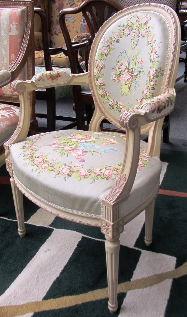 Appraisal: A Louis XVI style fauteuil with semi padded open arms