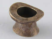 Appraisal: A silver match or toothpick holder shaped as a top