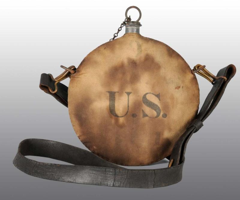 Appraisal: Cloth-Covered Spanish American War Canteen Description With leather strap Condition