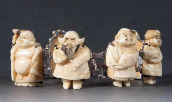 Appraisal: Chinese carved ivory and silver figural link bracelet each link