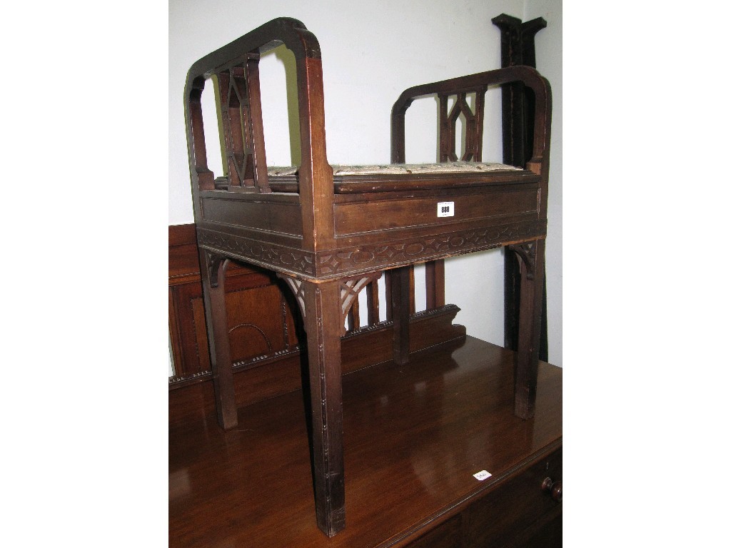 Appraisal: Piano stool with bun feet decoration