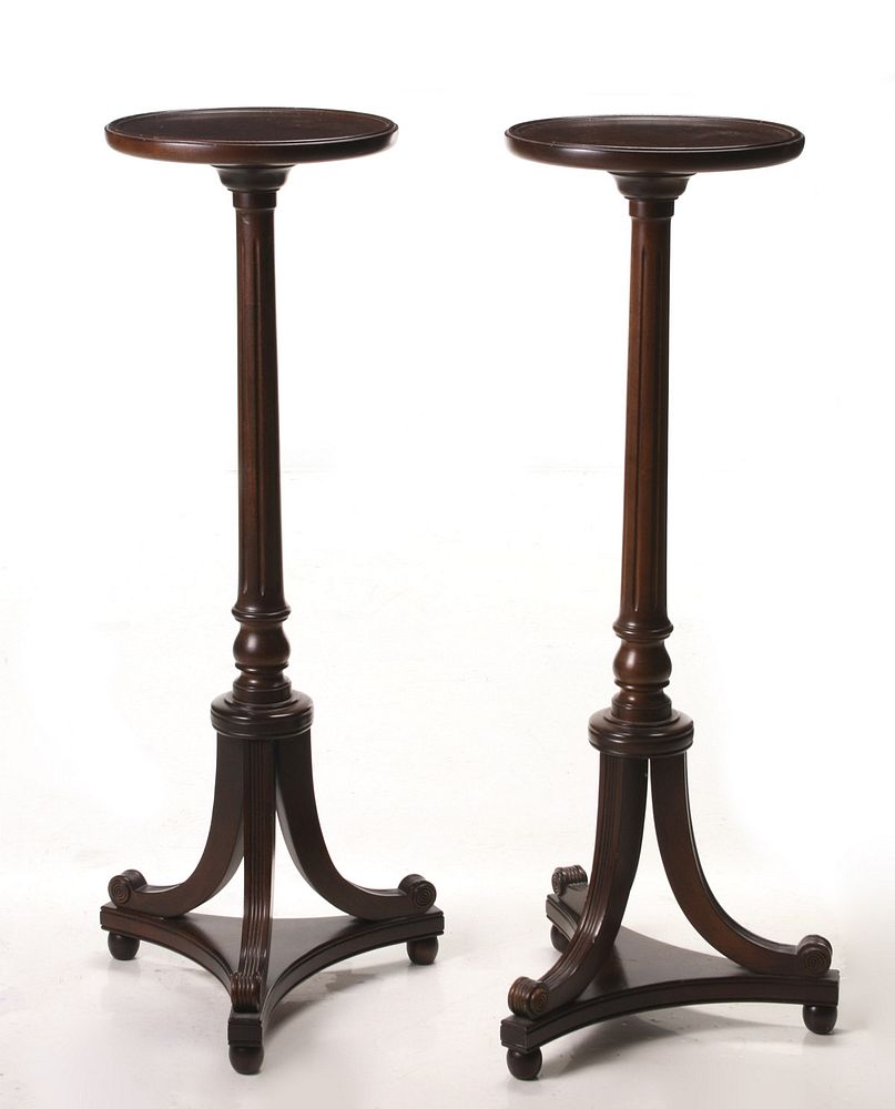 Appraisal: A PAIR TH CENTURY SHERATON INFLUENCE MAHOGANY STANDS Each circular