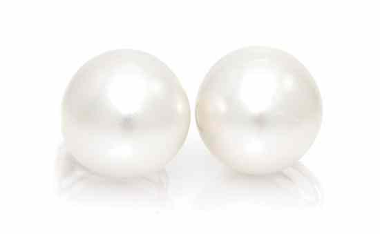 Appraisal: A Pair of Cultured South Sea Pearl Earclips measuring approximately