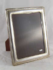 Appraisal: A silver faced photo frame x cm