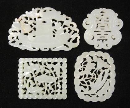 Appraisal: Four Chinese reticu lated celadon jade plaquesComprising an oval plaque