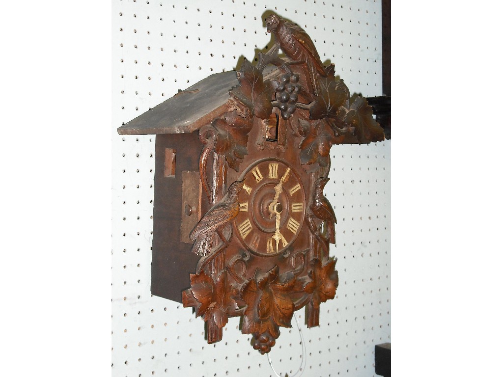 Appraisal: Black Forest two train cuckoo clock the dial with a