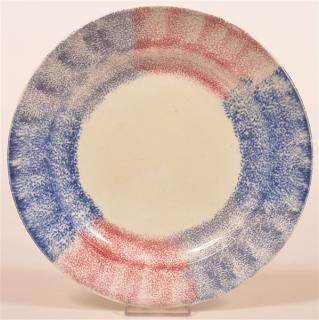 Appraisal: Three Color Rainbow Spatter Ironstone Plate Three Color Rainbow Spatter