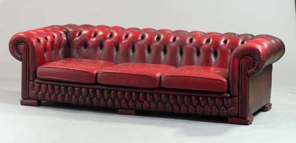 Appraisal: Edwardian Leather-Upholstered Chesterfield Sofa early th century the tufted and