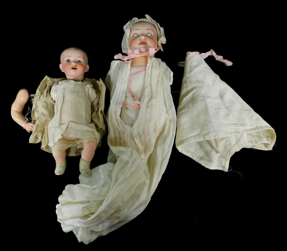 Appraisal: Two Dolls Hertel Schwab German Character baby loose stringing stationary