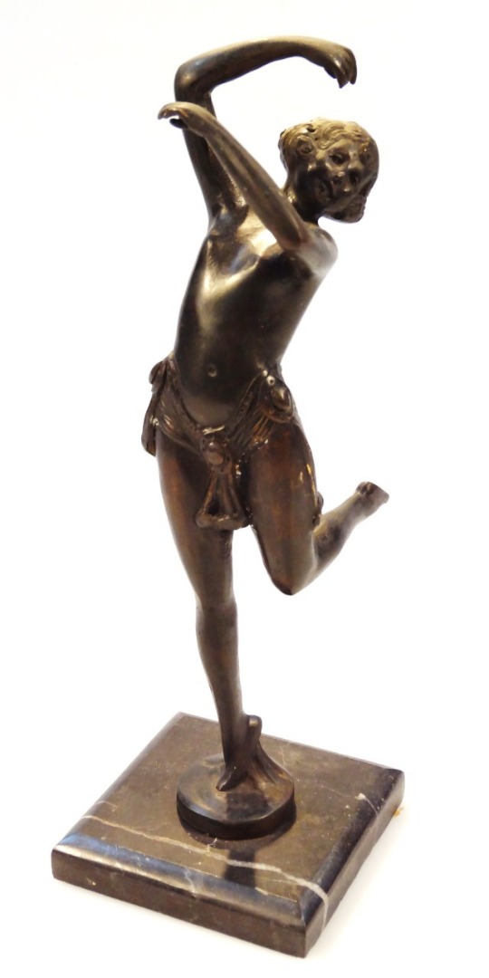 Appraisal: A thC Art Deco design bronzed marble finish figure of