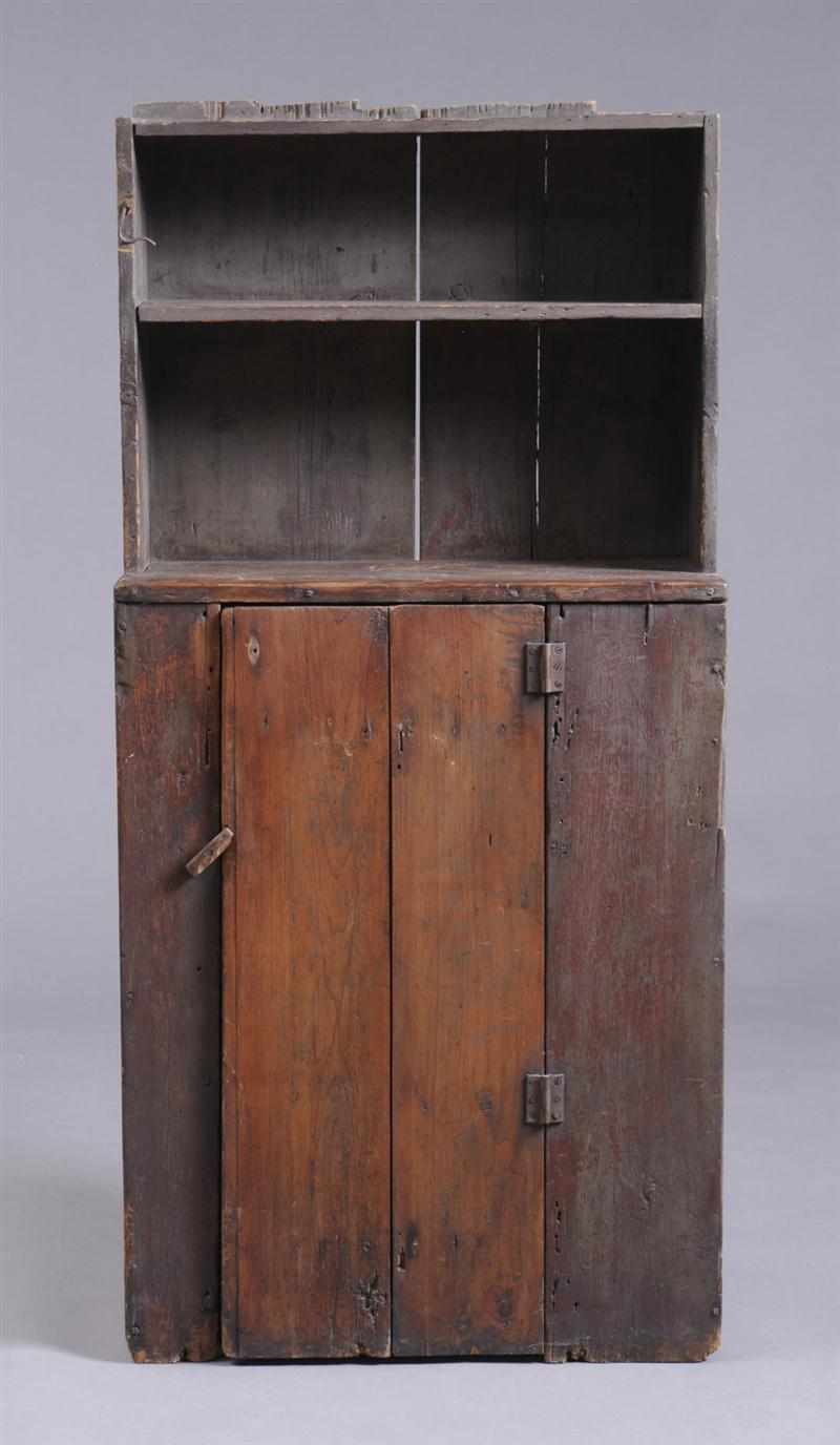 Appraisal: AMERICAN GRAY-STAINED PINE STEP-BACK CUPBOARD The two-shelf upper part above