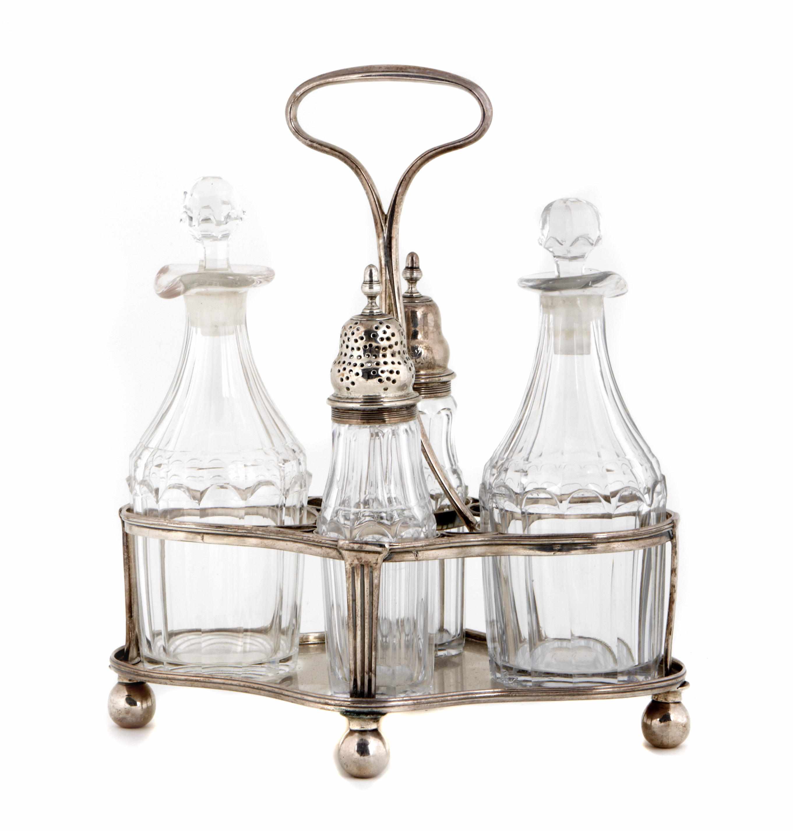 Appraisal: George III silver cruet frame with four glass fittings by