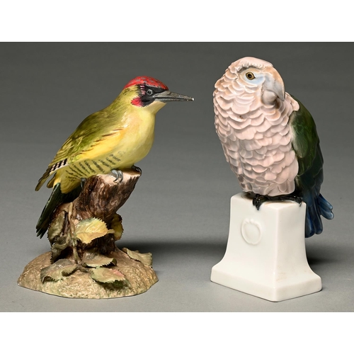 Appraisal: A Royal Crown Derby model of a green woodpecker and