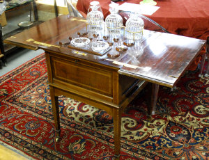 Appraisal: A satinwood inlaid mahogany metamorphic drinks table the double hinged