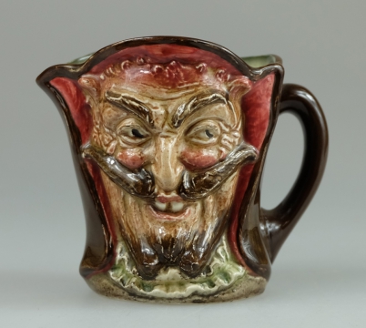 Appraisal: Royal Doulton small double sided character jug Mephistopheles with verse