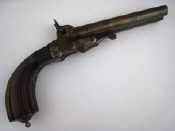 Appraisal: A double barrelled pistol with mahogany stock