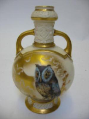 Appraisal: A ROYAL WORCESTER VASE of two handled globular form with