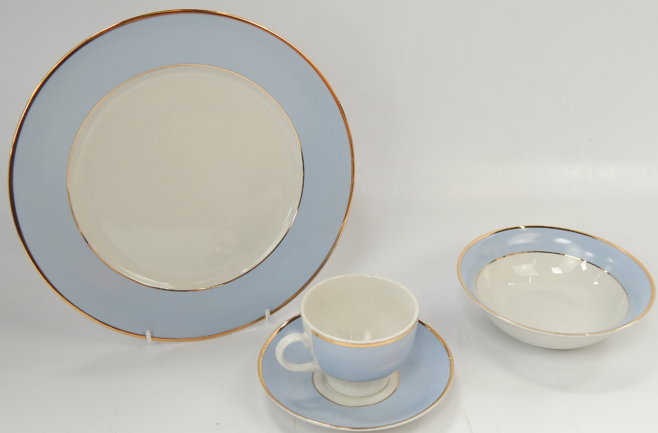 Appraisal: A Royal Doulton dinner service with blue border and gilt