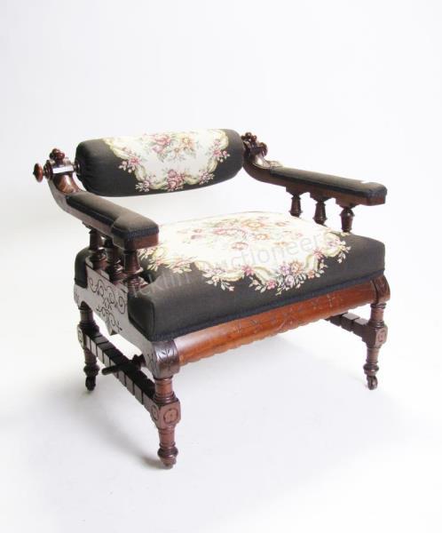 Appraisal: A Victorian slipper chair with carved walnut frame and tapestry-style