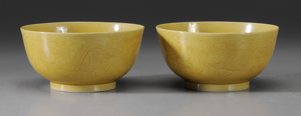 Appraisal: Pair Chinese Porcelain Bowls six-character Jiajing reign mark yellow glaze