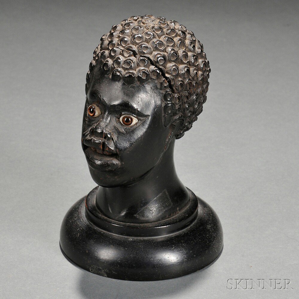 Appraisal: Carved Ebony Blackamoor Bust Inkwell late th century the figure