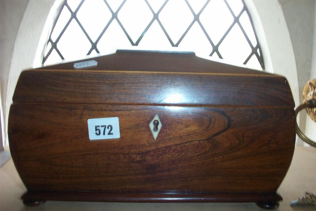 Appraisal: An early th century rosewood tea caddy with ring handles