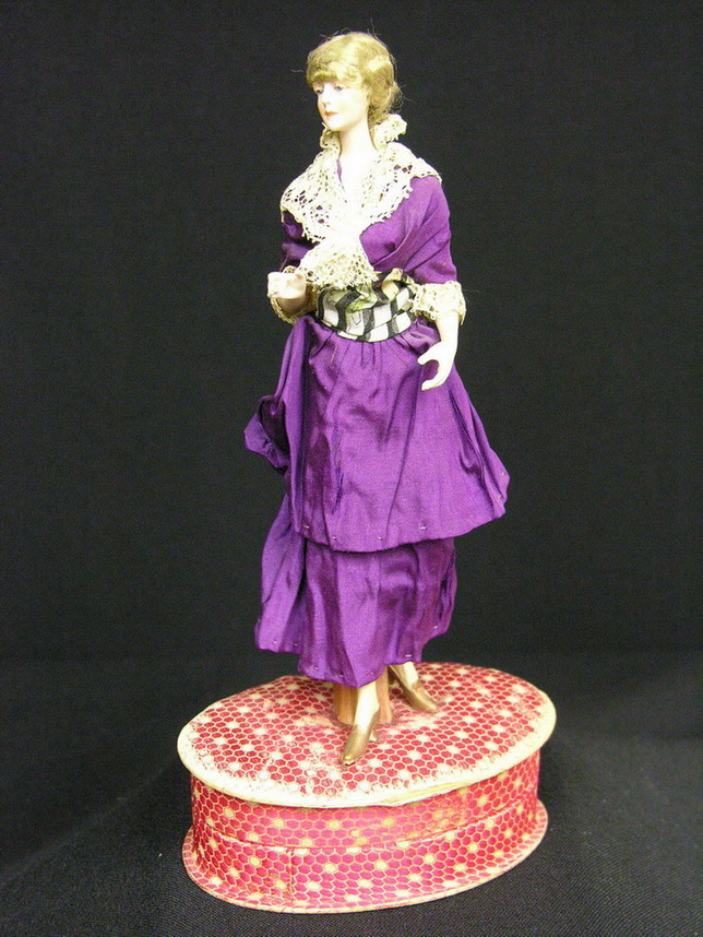 Appraisal: EARLY GERMAN FASHION DOLL FIGURINE CANDY BOX Bisque fashion figurine