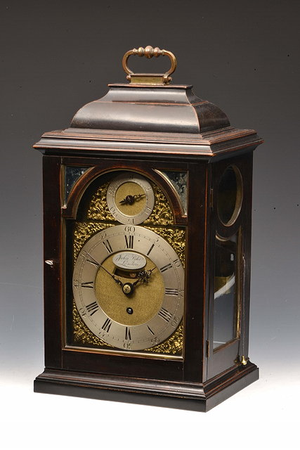 Appraisal: AN TH CENTURY EBONISED TABLE CLOCK with silent pull quarter