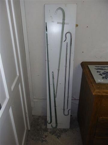 Appraisal: A COLLECTION OF GLASS WALKING STICKS in coloured twists in