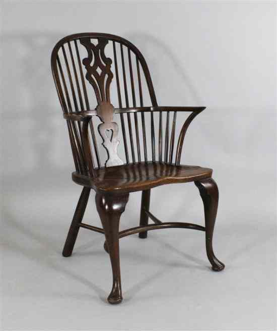 Appraisal: A th century yew ash and elm Windsor chair with