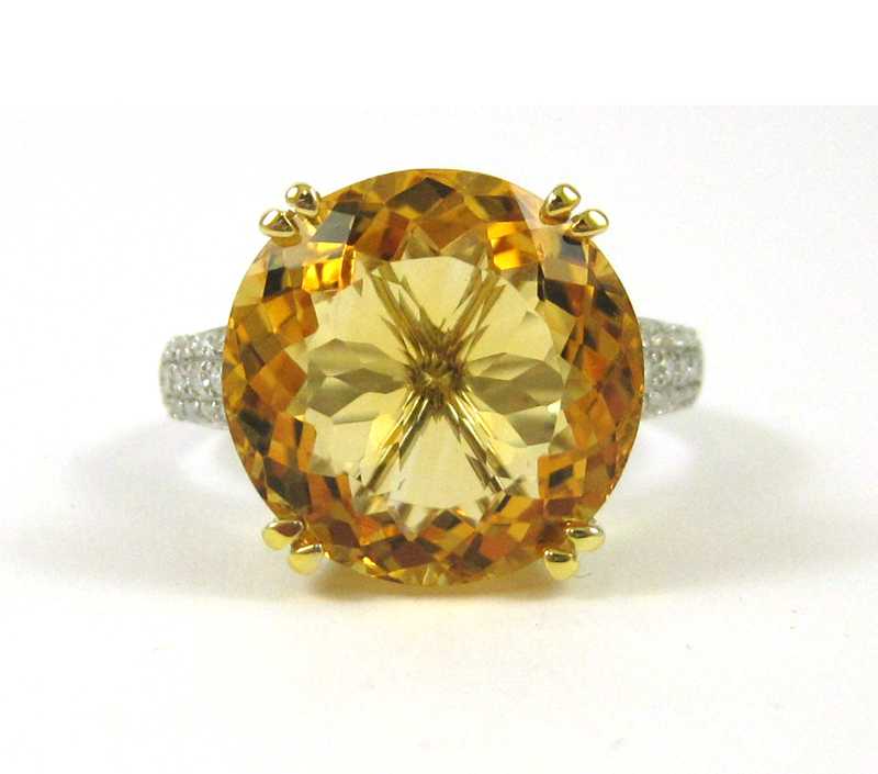 Appraisal: CITRINE DIAMOND AND FOURTEEN KARAT GOLD RING The white and