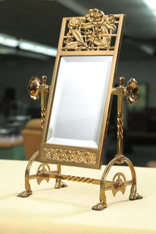 Appraisal: DRESSER MIRROR Brass with pierced floral adornment beveled mirror and