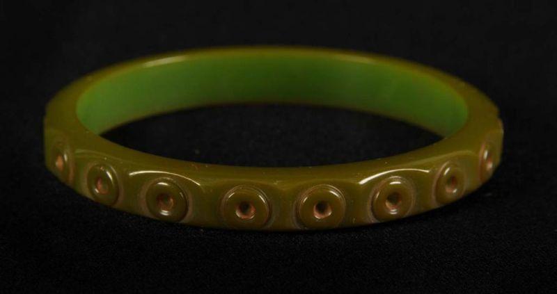 Appraisal: Bakelite Green Bracelet with Lifesaver Carvings Condition Excellent Size Dia