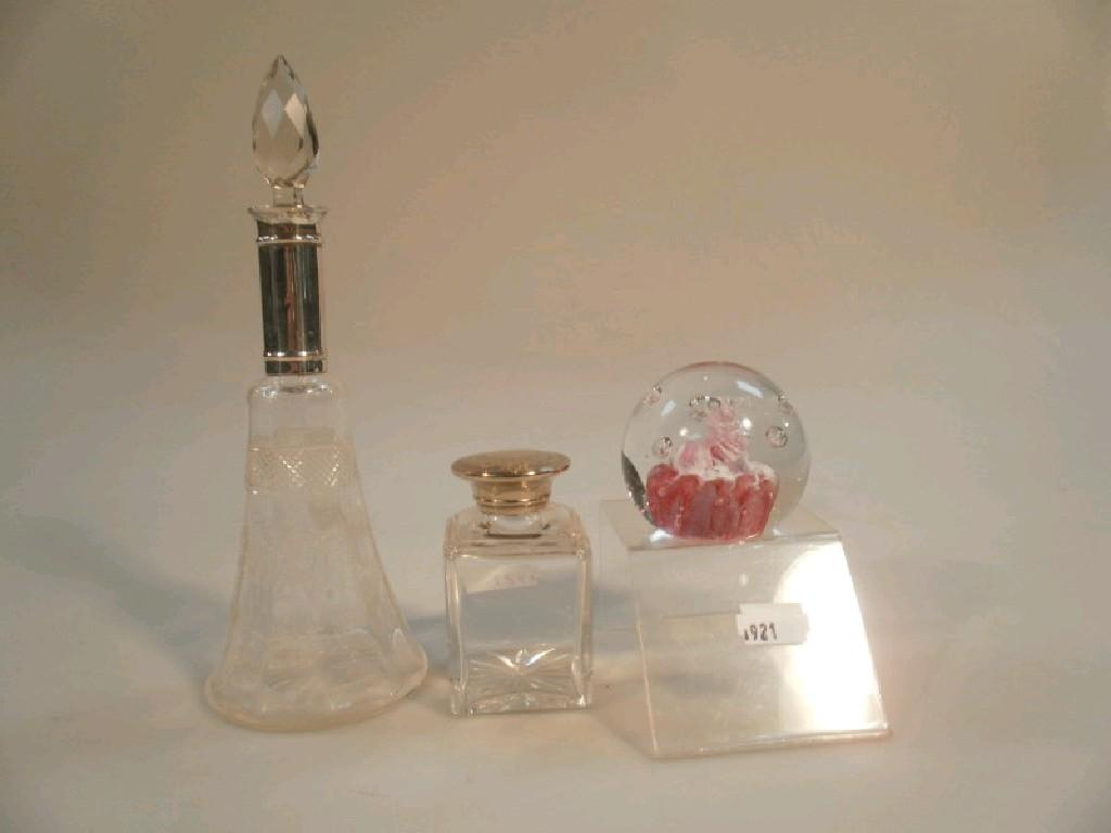 Appraisal: A silver mounted engraved conical scent flask with stopper a