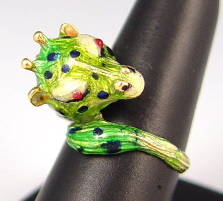 Appraisal: K ENAMELED SEA SERPENT FIGURAL RING K yellow gold ring