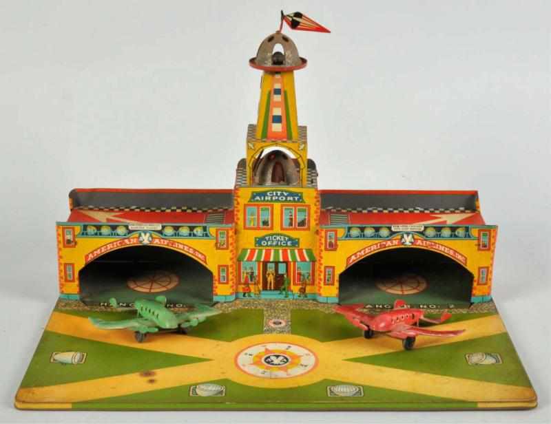 Appraisal: Tin Litho Wyandotte Airport Toy Description American Includes two original